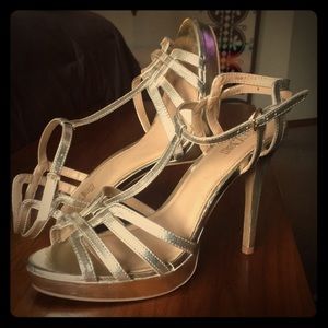 Brash golden strapped high heels